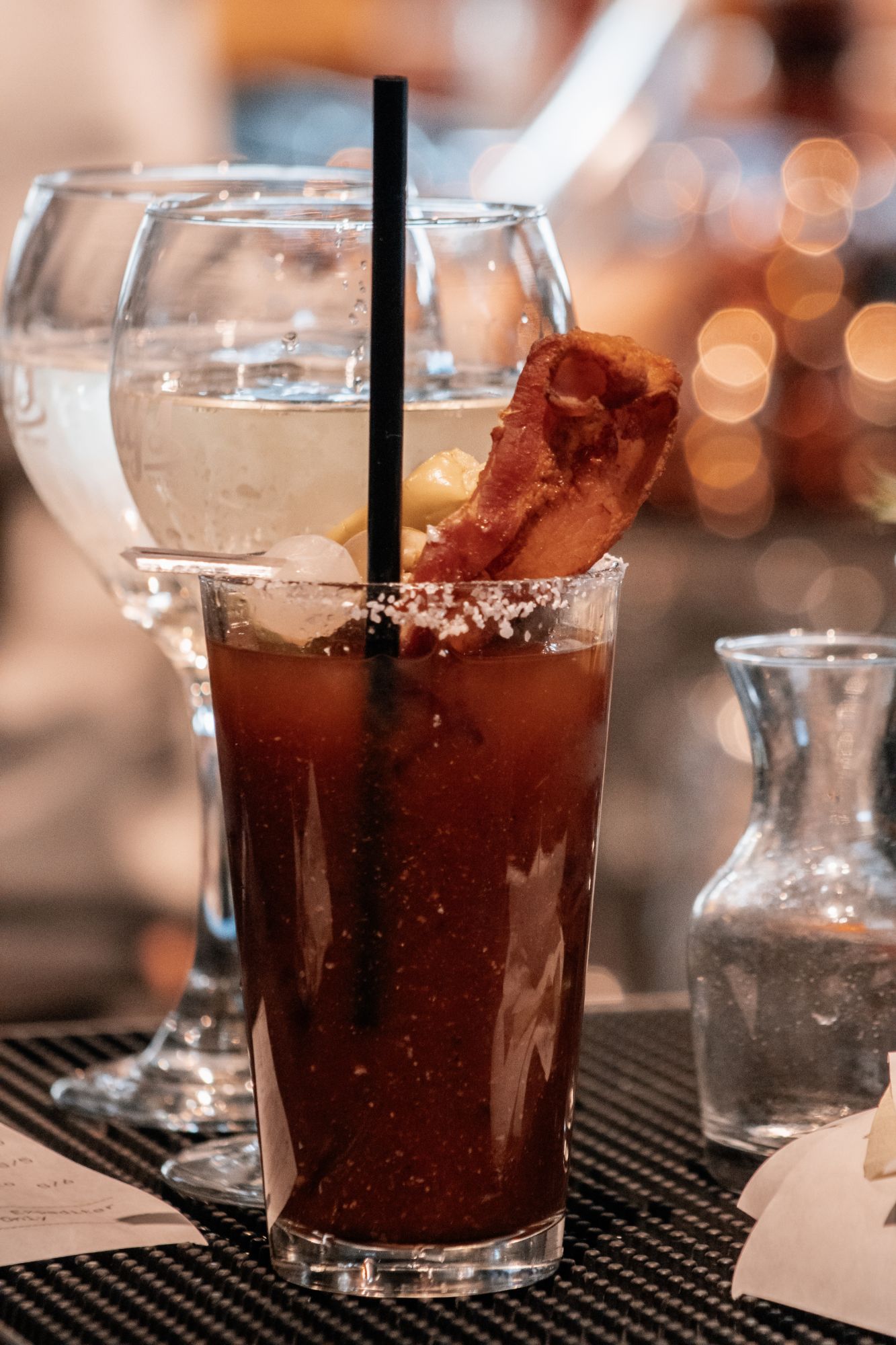 Bloody mary with bacon garnish